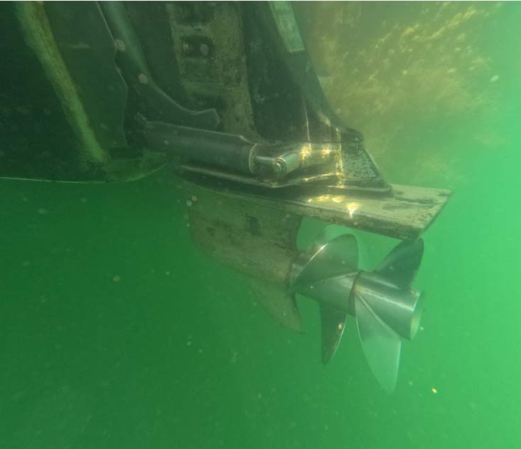 leaned underwater sterndrive and dual-propeller system on a large powerboat, demonstrating the results of expert underwater maintenance for high-value yachts